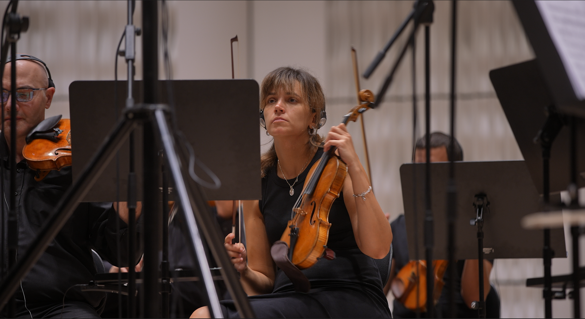 Violinist recording in studio